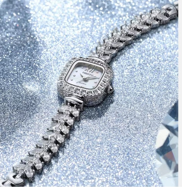 Montre Rivière NIBOSI "Éclat Stellaire" - Bracelet Cristaux Marquise & Cadran Nacre